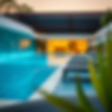 Luxurious swimming pool area at Al Furjan Club with sun loungers